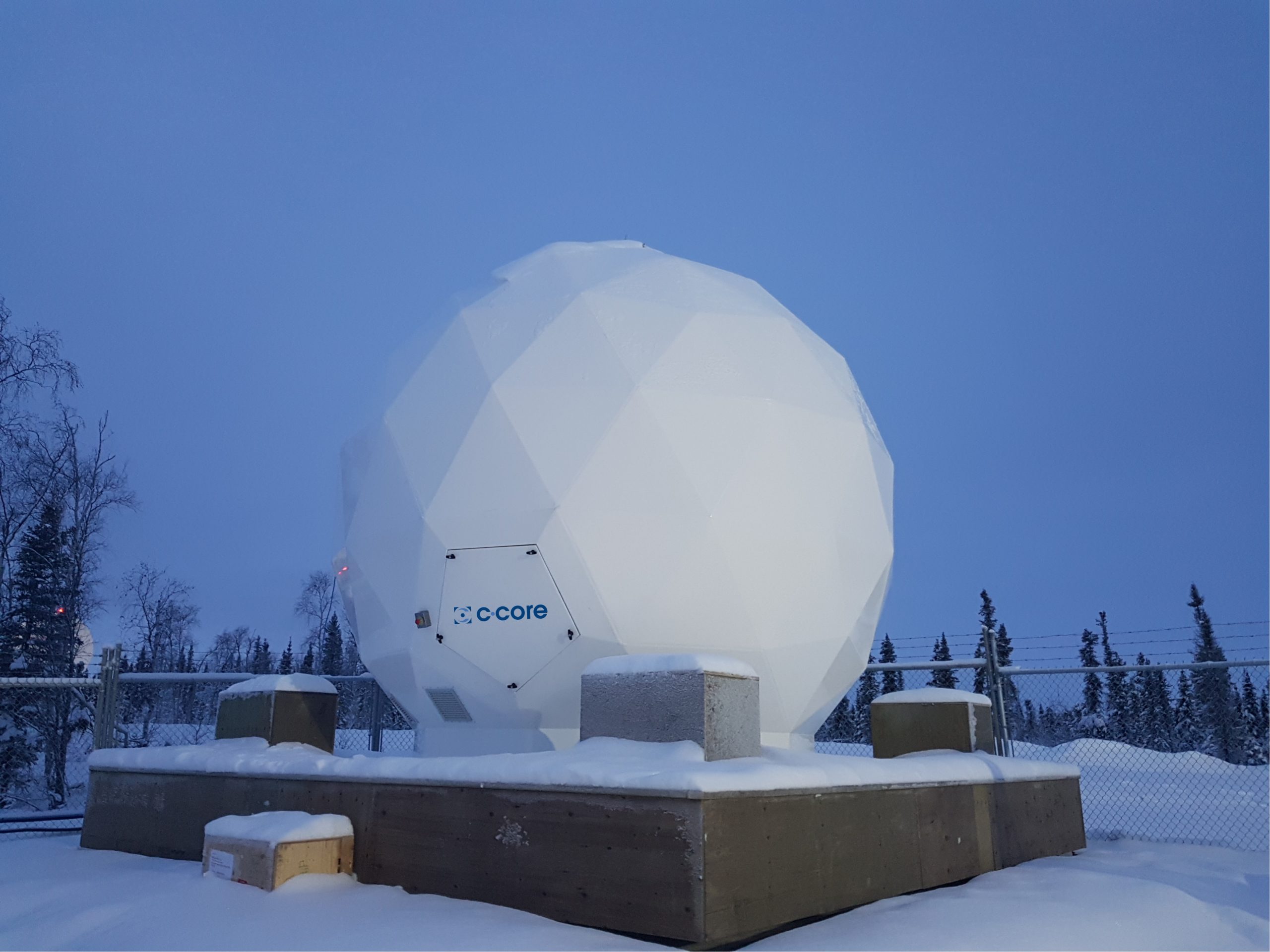 Inuvik’s Satellite Station Facility hosts C-CORE alongside Canadian, German, Swedish, and French operators, leveraging its secure Natural Resources Canada site, dependable high-speed fibre link, and year-round operations.